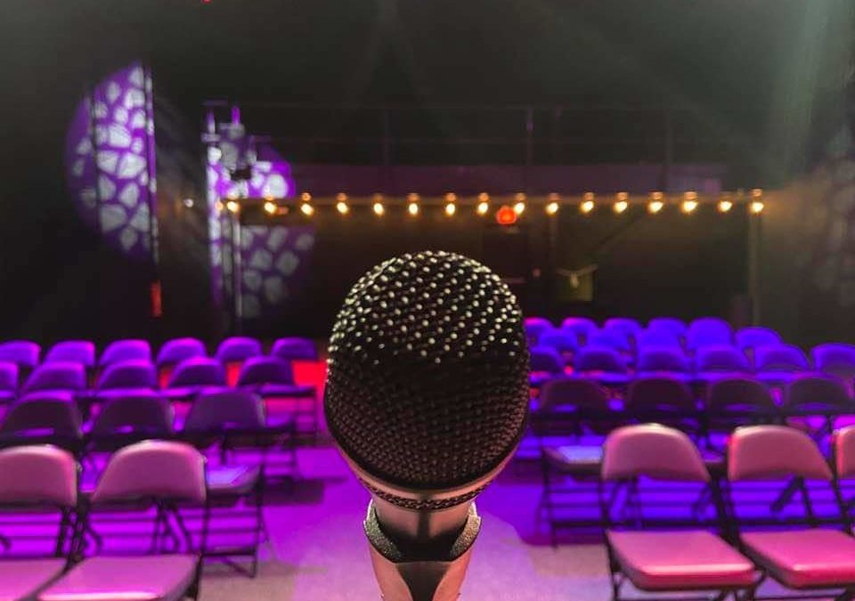 Close-up shot of a microphone on a stage