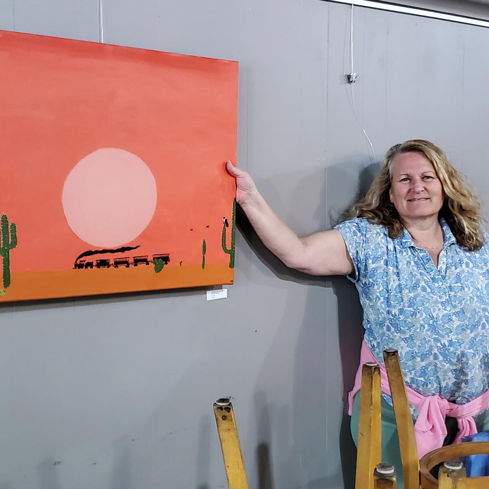 Susan Dodge next to painting