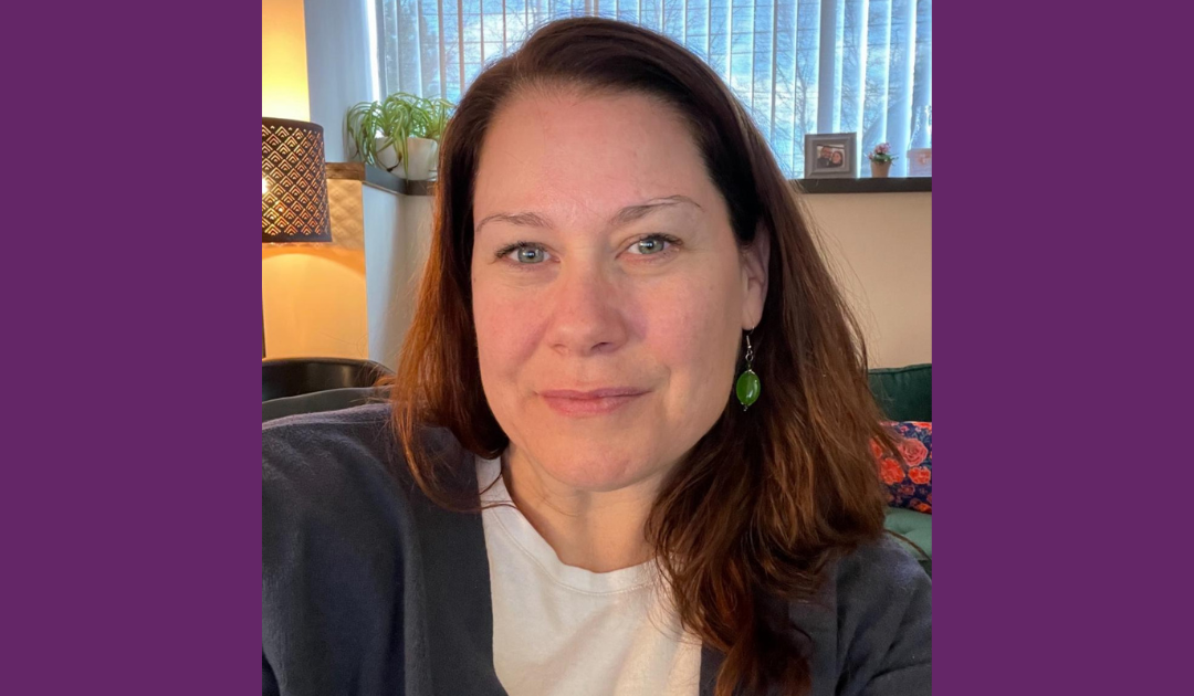 Headshot of Aimee Velazquez on a purple background