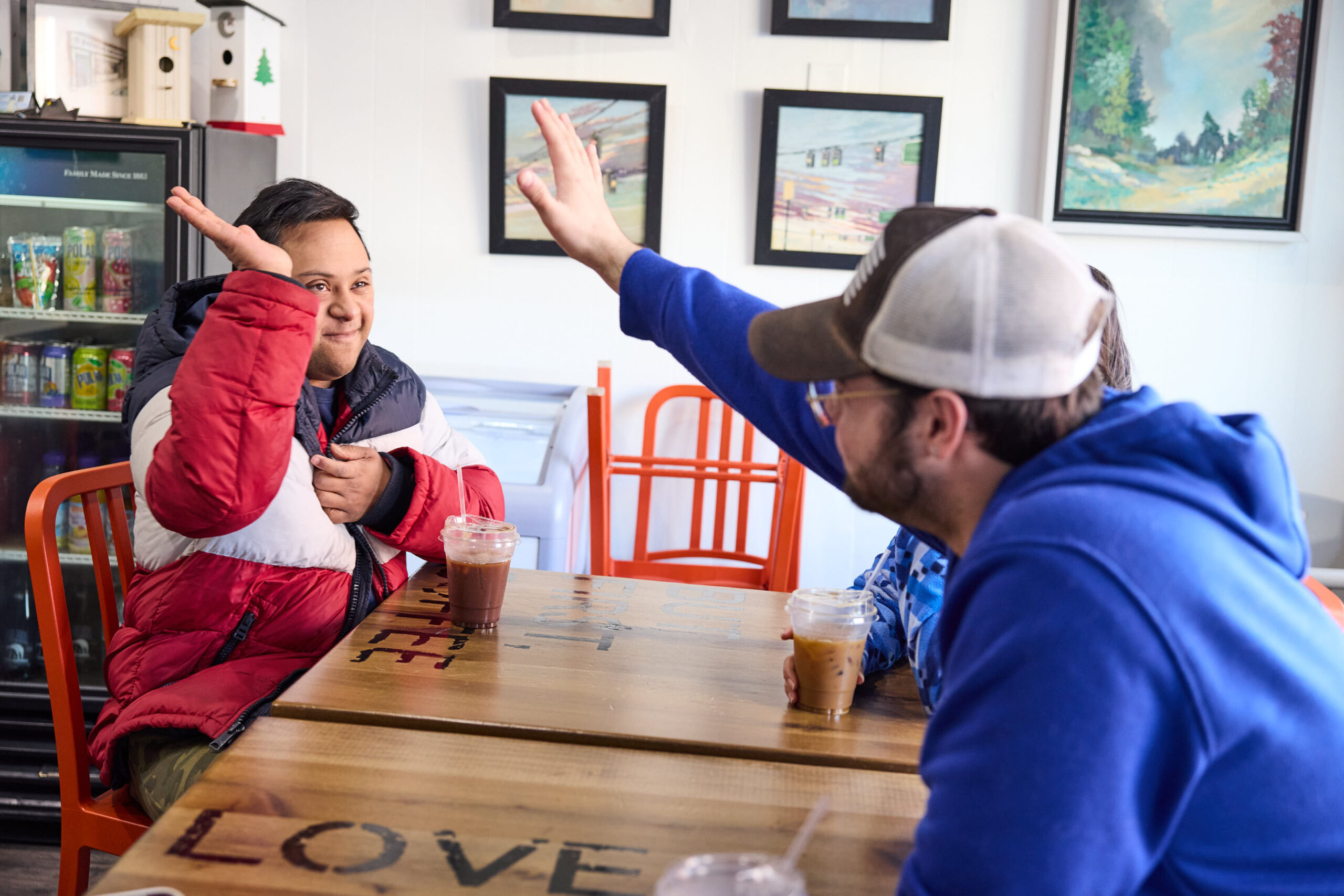 Breaking Grounds high five